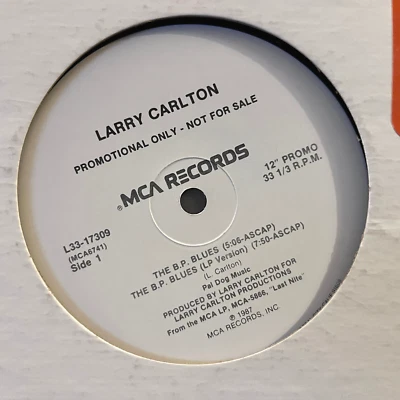 LARRY CARLTON - The B.P. Blues (1987) - 12" Vinyl Record Single - EX - Image 1 of 3