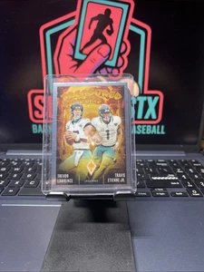 2024 Panini Phoenix - Treasured Tandems Trevor Lawrence, Travis Etienne #TT-JAX - Picture 1 of 2
