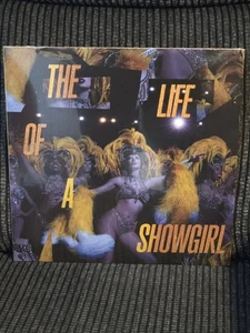 Das Leben eines Showgirls: Baby, das ist Showbusiness (schöner Blumenstrauß goldenes Vinyl) - Bild 1 von 2