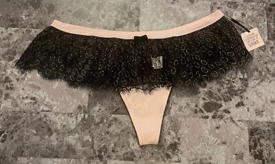 CALCINHA FIO DENTAL RARA RENDA CÍLIOS OURO PRETO ROSA LISO VICTORIA'S SECRET M NOVA COM ETIQUETAS - Imagem 1 de 4