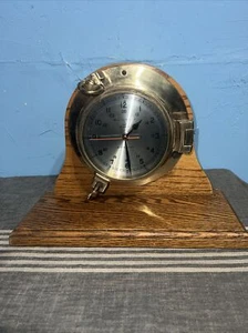 Polished Brass Quartz (Japan) Porthole Clock by Bell Clock Co. Oak Stand Working - Picture 1 of 6