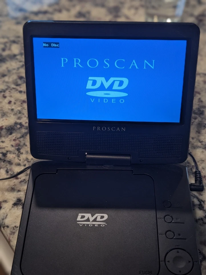 Reproductor de DVD portátil Proscan 7" pantalla giratoria LCD PDVD7040B sin control remoto Foto 1 de 4