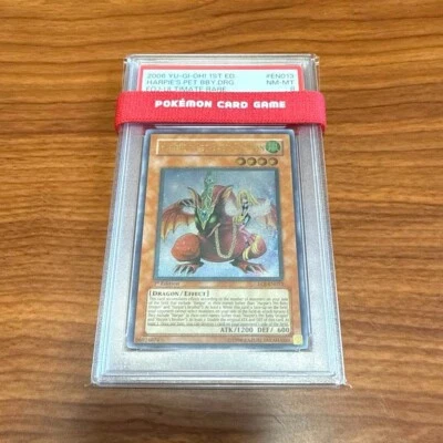 PSA  8 YU-GI-OH 1ST ED HARPIE'S PET BABY DRAGON EOJ #EN013 ULTIMATE RARE 2006 - Image 1 of 3