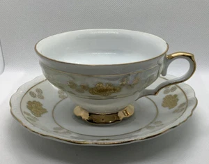 Taza de té y platillo Aaco con borde dorado - Imagen 1 de 7