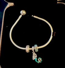 Pandora Bracelet With Disney Ariel Charm Plus A Pink And Turquoise Charm