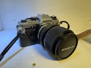 Olympus OM-10 35mm SLR Film Camera w/ 35-80mm Auto Zoom Zuiko f/1:4 Lens & Strap - Picture 1 of 6