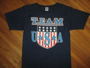 CAMISETA DE COLECCIÓN DEL EQUIPO DE ESTADOS UNIDOS DE LOS AÑOS 80 Y 90 LOGOTIPO Atleta Deportivo Olímpico 7 Bandera de América MED - Imagen 1 de 3