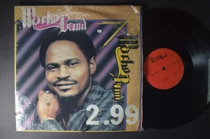 MACHO BAND WORLD LP Shrink - Picture 1 of 2
