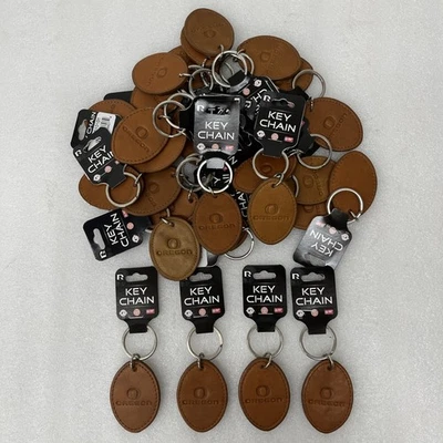 Lot of 28 Oregon Ducks Leather Key Chains - Image 1 of 3