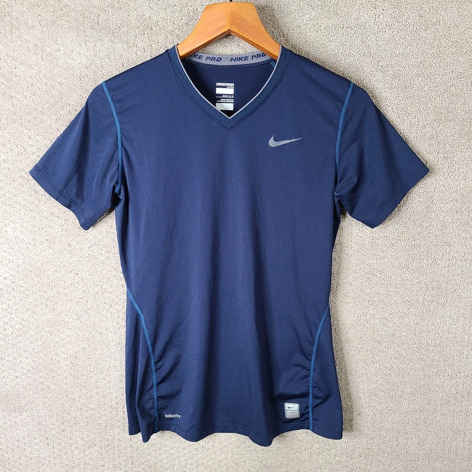 Camisa Nike Pro para mujer mediana azul ajustada cuello en V atlética elástica manga corta Foto 1 de 4
