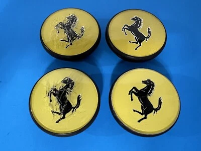 FERRARI GENUINE FACTORY ORIGINAL OEM YELLOW CENTER CAPS SET OF 4 - Image 1 of 4
