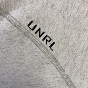 UNRL Golf x Rolex Crossover Herren XL V-Ausschnitt T-Shirt Poly Baumwolle Rayon Grau S/S - Bild 1 von 6
