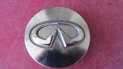 Cubierta central cromada Infiniti OEM 1997-2015 G20 G35 I30 J30 JX35 40343 5P215 Foto 1 de 4