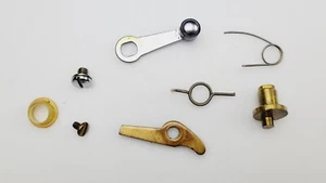 Penn 711 8pc Reel Part Kit - AR Dog, Eccentric, Lever, Liner, Screw, Spring - Picture 1 of 3