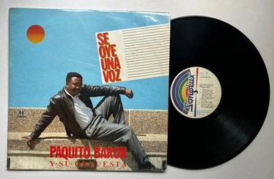 PAQUITO BARON Y SU ORQUESTA  SE OYE UNA VOZ SALSA   ♫ - Image 1 of 2