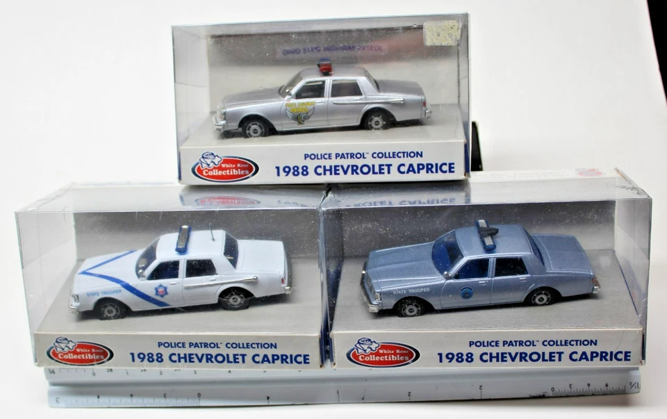Chevrolet Caprice 1988 - Coches de policía estatal - escala 1:43 - rosa blanca - 2 + 2 nuevos Foto 1 de 4