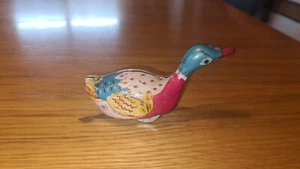 Lauf-Vogel Blechspielzeug mit Mechanik "Ente Made in China" - Bild 1 von 4