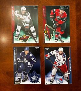 A Collection of 4 Hockey Fathead Tradeables