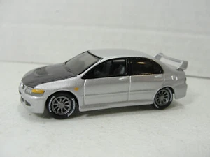 Johnny Lightning Classic Gold '04 Mitsubishi Lancer Ev. 1:64 Loose - Picture 1 of 3
