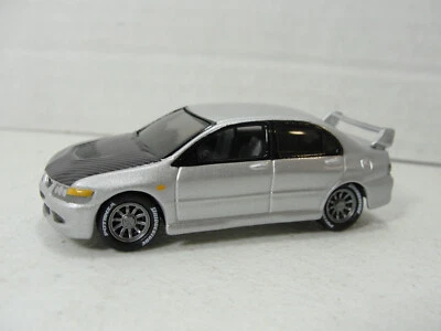 Johnny Lightning Classic Gold '04 Mitsubishi Lancer Ev.  1:64 Loose - Image 1 of 3