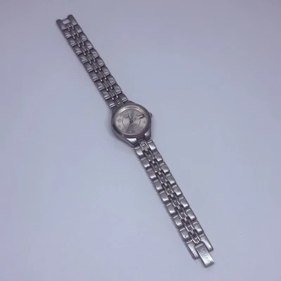 Reloj para mujer Sharp SHP5304 vintage 23 mm tono plata fecha 7,25” esfera rosa 31 Foto 1 de 4