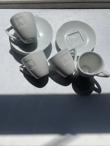 Juego de 4 tazas y platillos Nespresso de porcelana blanca Espresso Demitasse Portugal - Imagen 1 de 12