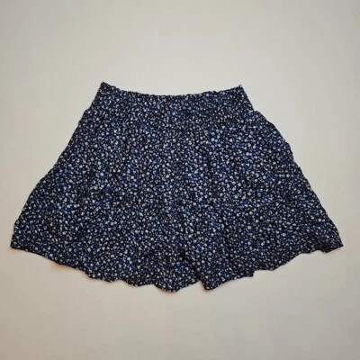 Falda corta Gap para niños niñas con volantes en capas tejida floral negra azul blanca talla M Foto 1 de 4