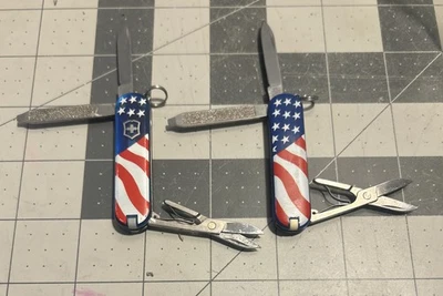 Lot Of 2 Victorinox Classic SD Swiss Army Knife 58mm American Flag - Image 1 of 3