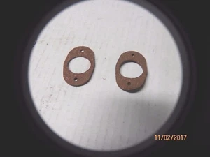 NOS 1963 STUDEBAKER AVANTI PARKING LIGHT SOCKET GASKETS - Foto 1 di 1
