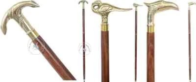 Juego de 3 bastones de madera vintage con mango de latón con cabeza de animal diferentes Foto 1 de 4