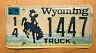 1998 WYOMING GRAPHIC BUCKING BRONCO TRUCK LICENSE PLATE " 14 1447 " WY 98