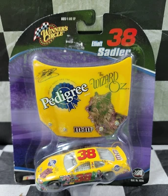 2004 Action Elliott Sadler #38 THE WIZARD OF OZ Pedigree Ford Taurus 1:64Diecast - Image 1 of 3