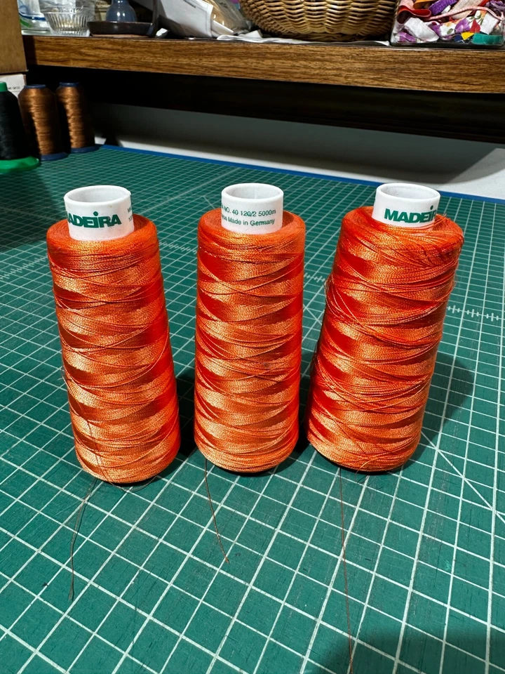 qty 3 Madeira 100% Rayon 40 5000m spools color 1178 orange lightly used  - Image 1 of 1