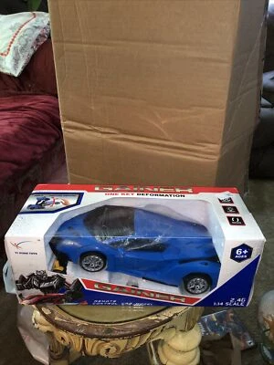 GAINER ONE KEY DEFORMATION REMOTE CONTROL CAR 1:14 Scale Red&Black - Image 1 of 4