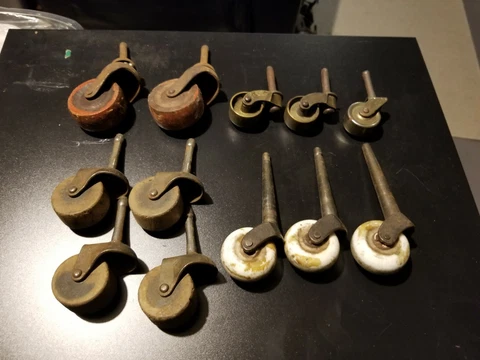 Lot of 12  Salvage Wooden, Porcelain & Metal Swivel Caster Wheels Cover