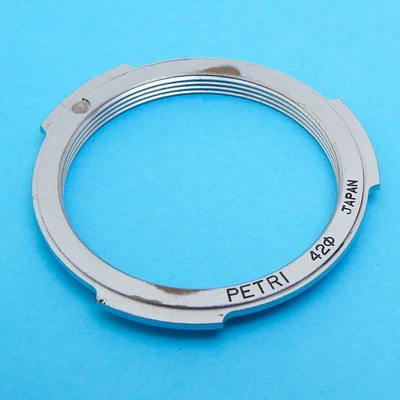 ADAPTER TO USE M42 THREAD MOUNT LENSES ON PETRI BREECH MOUNT BODIES #AD791 - Image 1 of 2