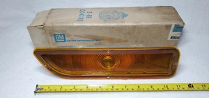 NOS GM 2450457 1962 - 66 CHEVROLET LH AMBER TURN LIGHT LENS & HOUSING - Picture 1 of 8