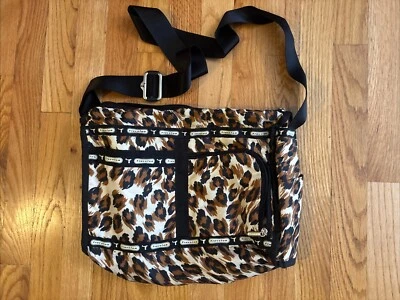 Bandolera Travelon Bolsillos con Estampado de Animales Bolso de Viaje Cartera de Mano Ligera Foto 1 de 4