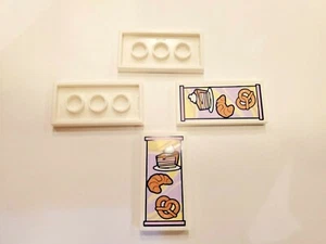 4x - LEGO White Tile 2 x 4 with Pie, Croissant and Pretzel Menu Pattern... - Picture 1 of 1