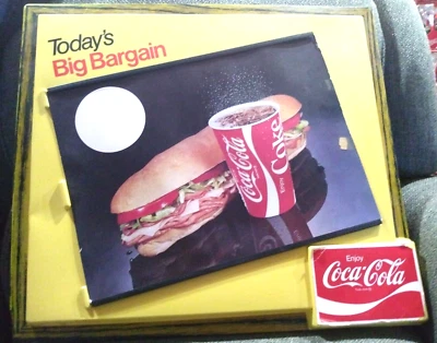 Letrero de plástico Coca-Cola 1960 publicidad vintage gran ganga de hoy Foto 1 de 4