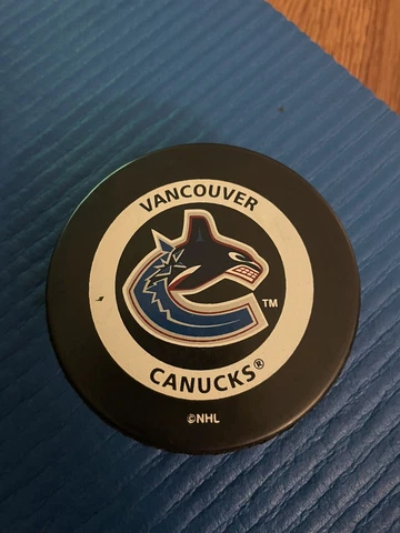 Vancouver Canucks Inglasco Official Game Puck - Orange Ring Back Cover