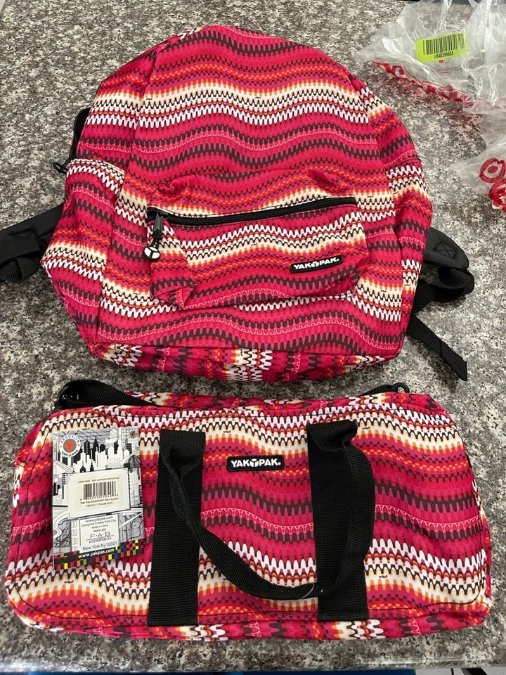NOVO COM ETIQUETAS YAK PAK MINI BOLSA DE VIAGEM E CONJUNTO DE MOCHILA  - Imagem 1 de 2