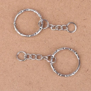 50 Pezzi Portachiavi Spaccato in Metallo Portachiavi Tondo Torto con Catena e Anello da Appendere - Foto 1 di 11