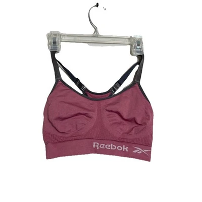 Sujetador deportivo Reebok talla pequeña rosa ligeramente acolchado suéter inalámbrico Foto 1 de 4