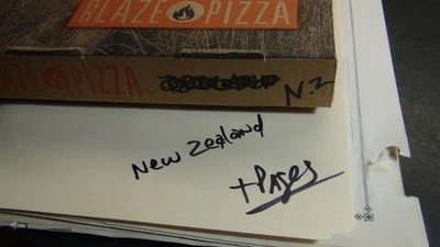 Stampsweis New Zealand stamps on pages glassines est 2300 stamps in Pizza Box  - Image 1 of 4