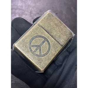 【Kostenloser Versand】Zippo Peace Mark Gold Modell 2022 - Bild 1 von 6