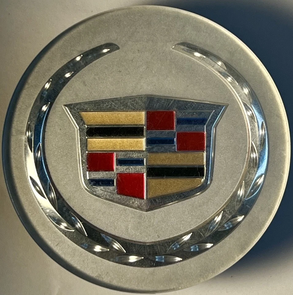 Tapa central CADILLAC OEM 9597375 64 mm ATS ELR SRX XTS DTS STS XLR CTS Foto 1 de 2