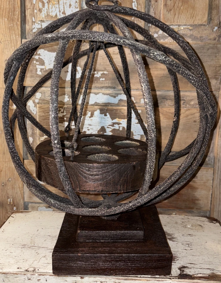 A contemporary Uttermost Sammy metal and wood candleholder. - Image 1 of 4