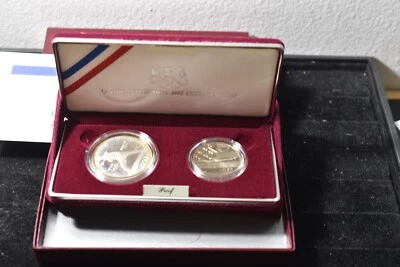 US  1992 S    OLYMPICS 2 COIN SET-DOLLAR HAS TONING  w. COA-MINT PACKAGING - Image 1 of 4