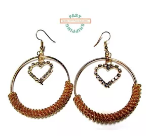 Orecchini moda cuore e cerchio tono oro con pietre finte ORDINA ENTRO LE ORE 10!!! - Foto 1 di 1